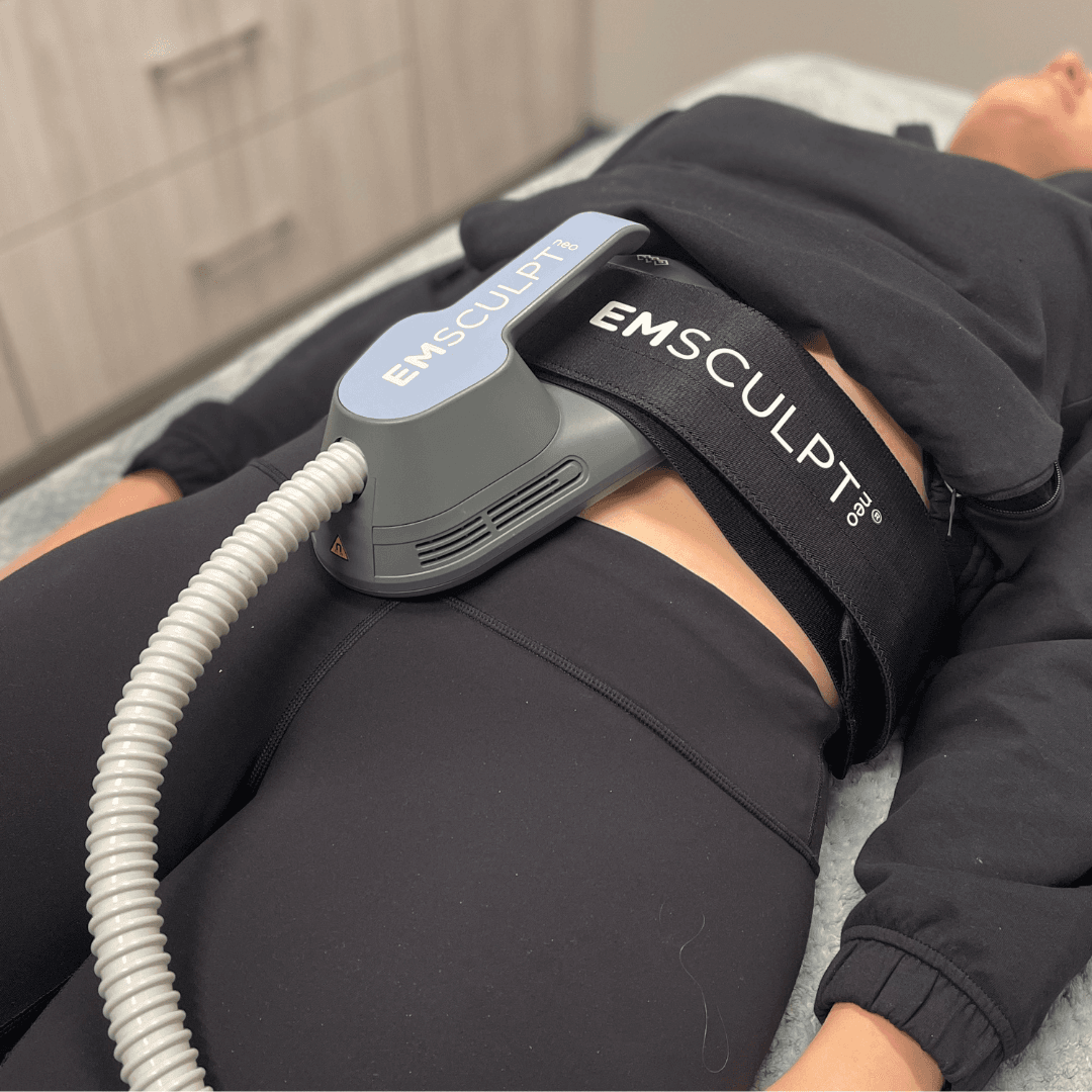 Crown Point EmSculpt Neo model receiving treatment