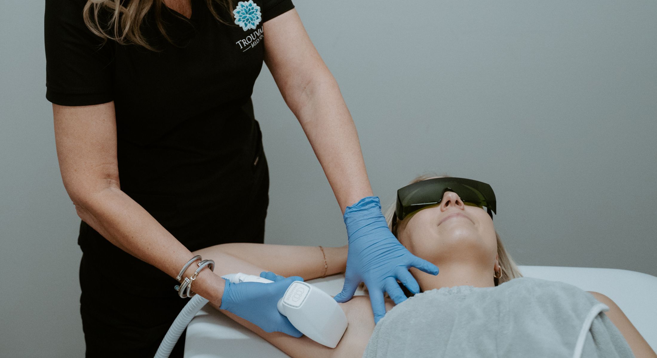 Crown Point Laser Treatments patient model receiving treatment